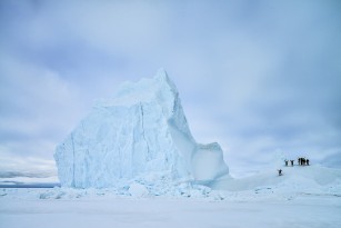 Climbing Icebergs at Arctic Canada Nunavut